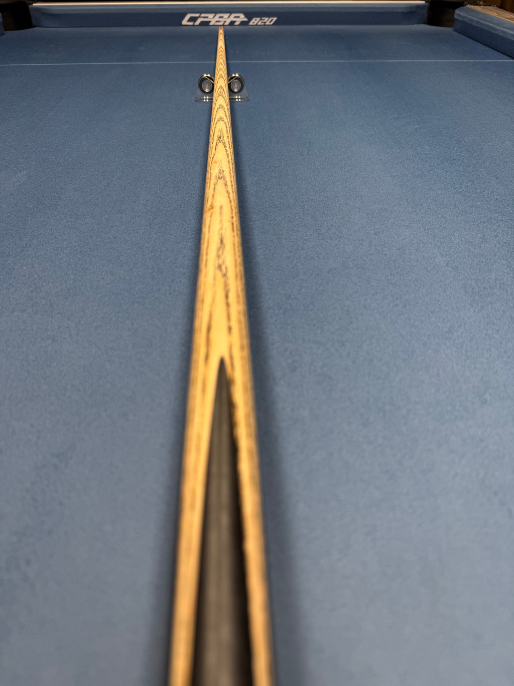 Anglesey Cuesports Green Peacock Cue No.028 - full length view from butt end on table