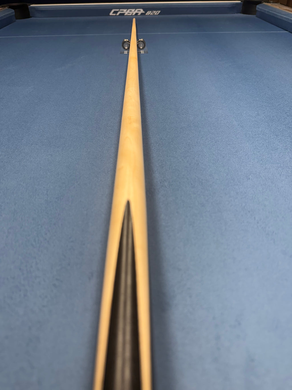 Anglesey Cuesports Blue Peacock Maple Cue No.020 - full length tip end view on table