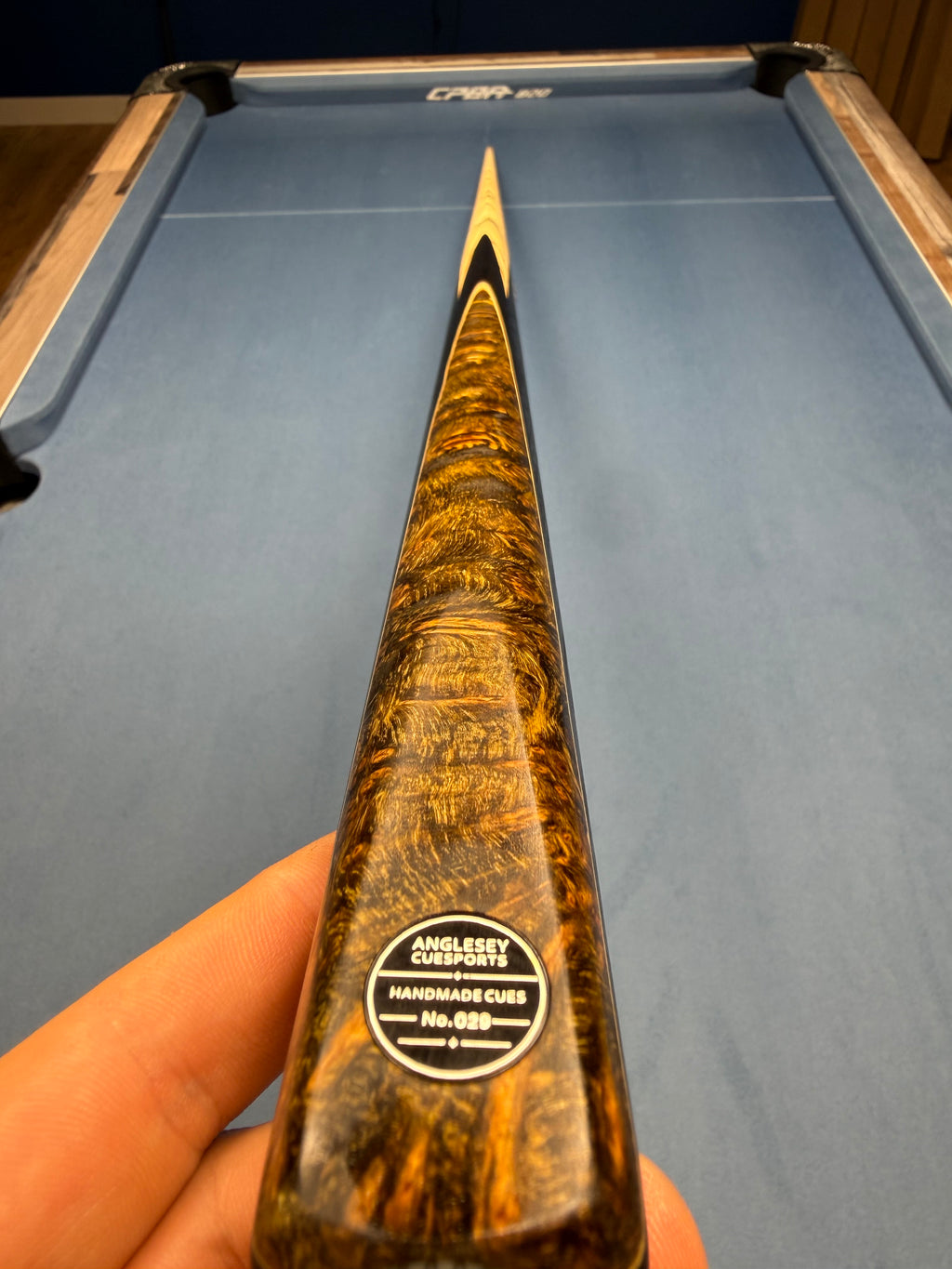 Anglesey Cuesports Dark Tiger Cue No.029 - hand-held butt view showing No.029 badge and tiger grain