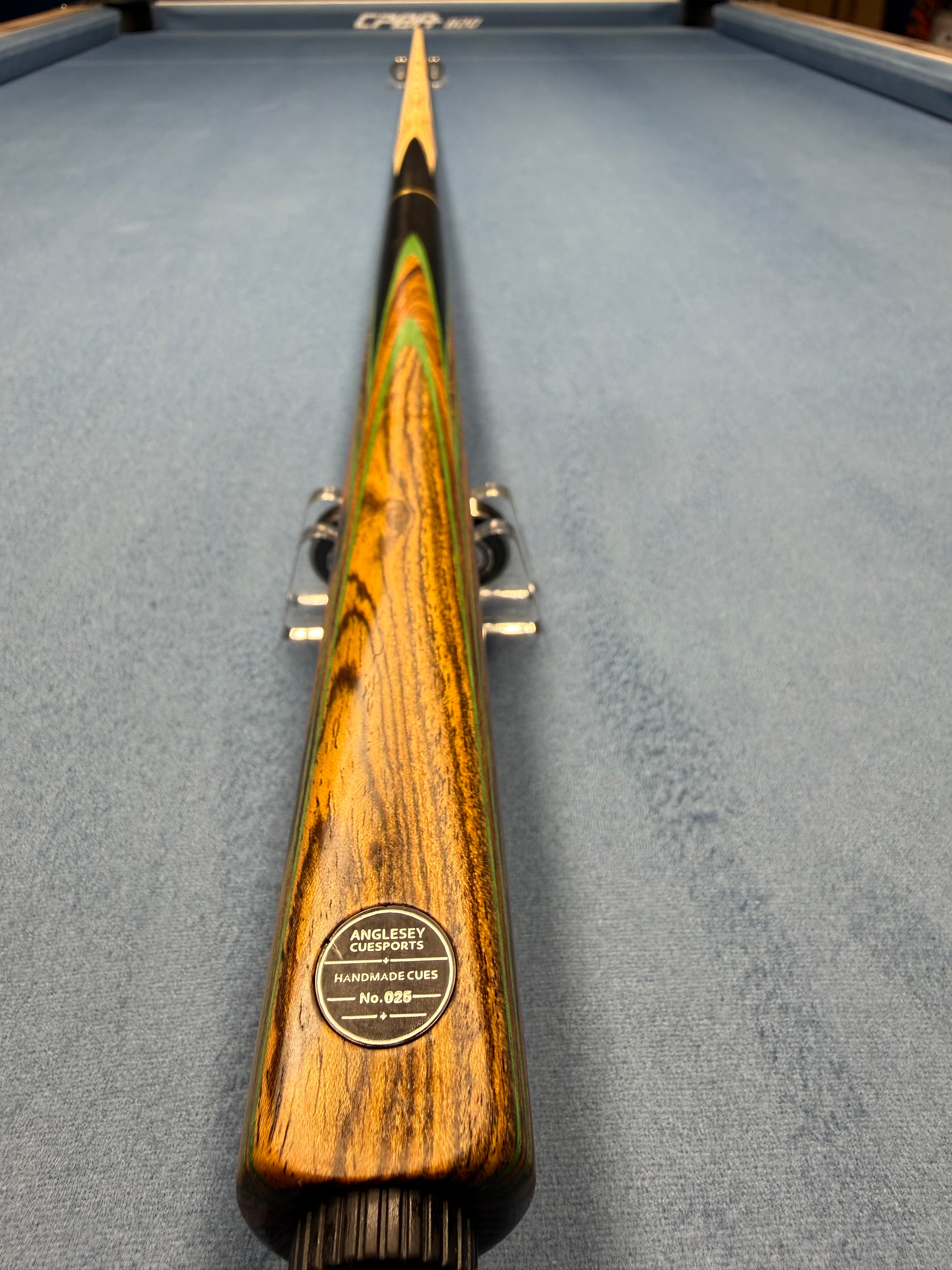 Anglesey Cuesports Zebrawood Cue No.025 - full length butt end view showing zebrawood and green resin splices