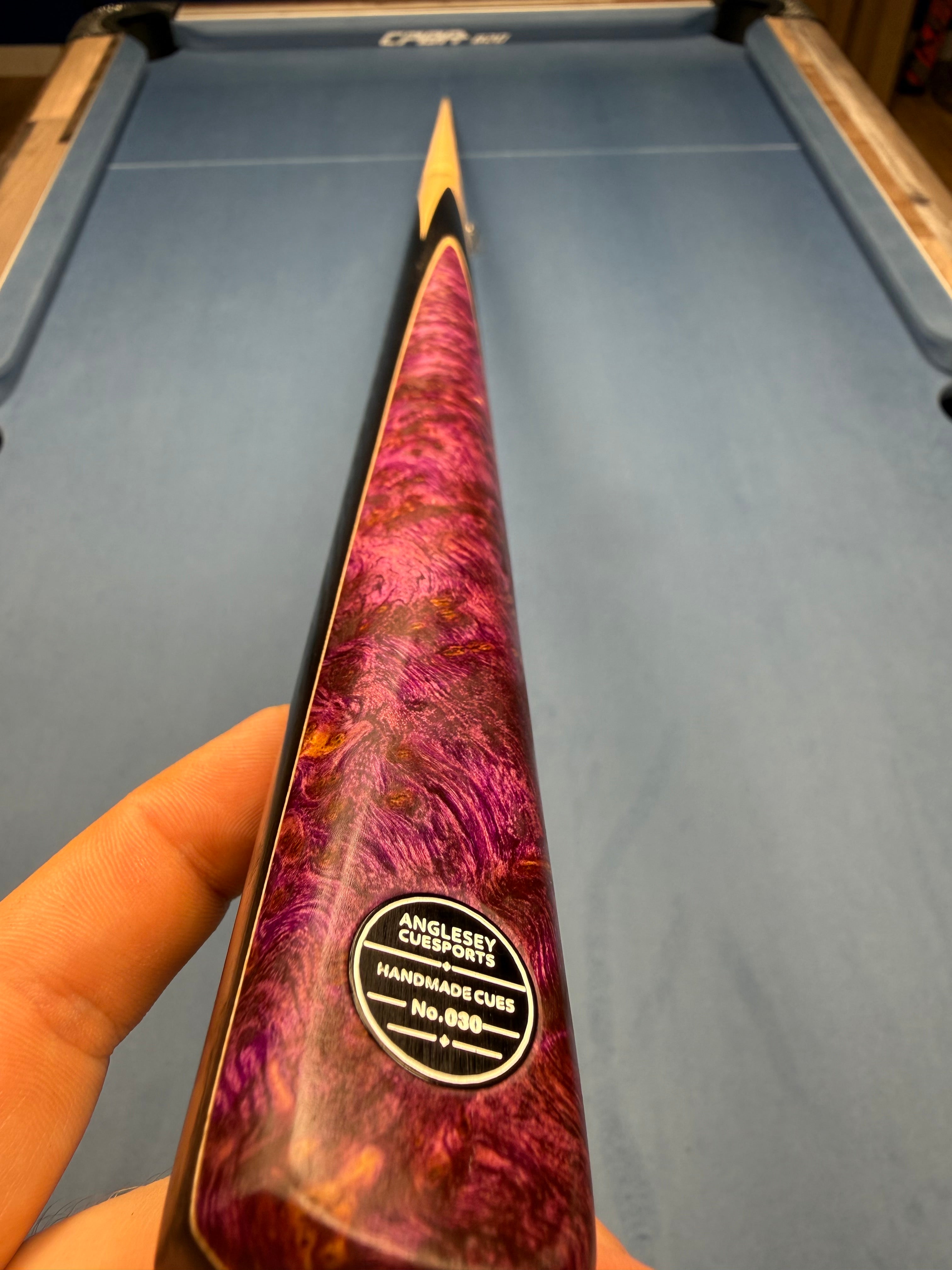 Anglesey Cuesports Purple Haze Burr Cue No.030 - hand-held butt view showing No.030 badge and purple burr grain